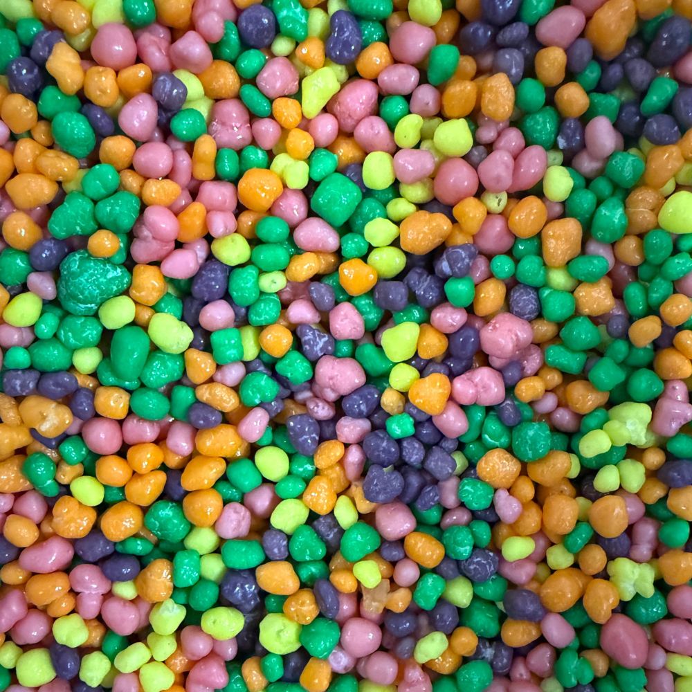 Colorful Nerds Rainbow Candy in a bulk value bag, crunchy candy by Candy In Bulk, showing vibrant, crunchy candy pieces.
