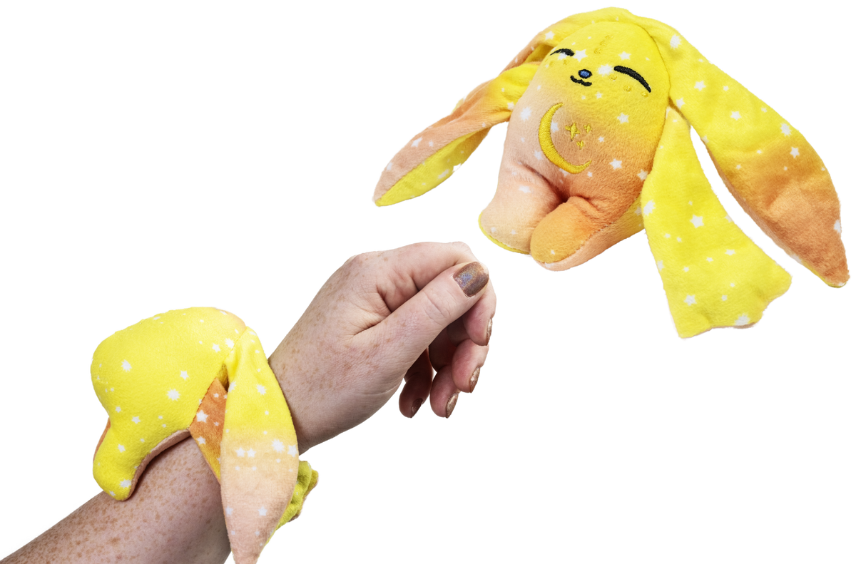 Soft Moon Pals Spark Mini Wrist Hugger plush toy with colorful design, perfect for wrist wear and cuddling.
