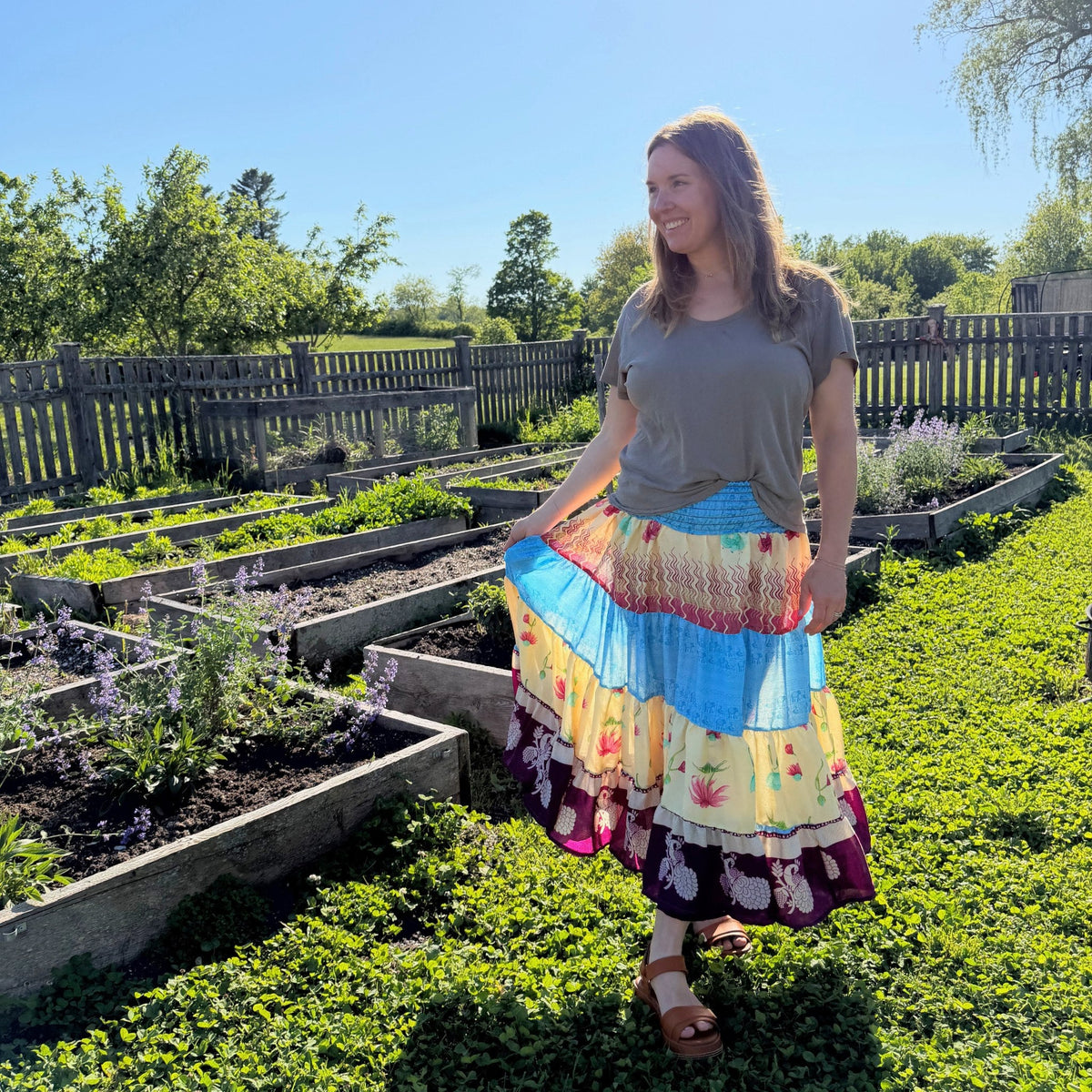 Darn Good Yarn Woodstock Dreams Fiesta Sunset skirt featuring vibrant, bohemian-inspired fabric with colorful patterns and flowy design.