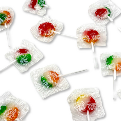 Assorted flavor Tiger Pops lollipops in a bulk Candy In Bulk package, colorful round candies on sticks.