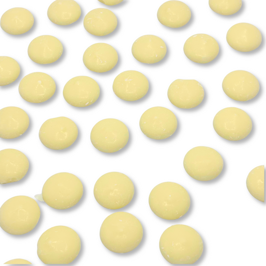 White vanilla-flavored Candy In Bulk chocolate coating and melting wafers in a large bulk bag, ideal for confectionery and baking.