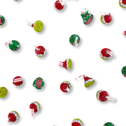 Hershey's Kisses Milk Chocolate Grinch candies in bulk, featuring festive green and red foil wrapping, from Candy In Bulk.