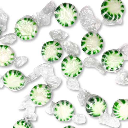 Bulk Starlight Spearmint Hard Candy from Candy In Bulk, showing bright green spearmint candies in a clear bag.