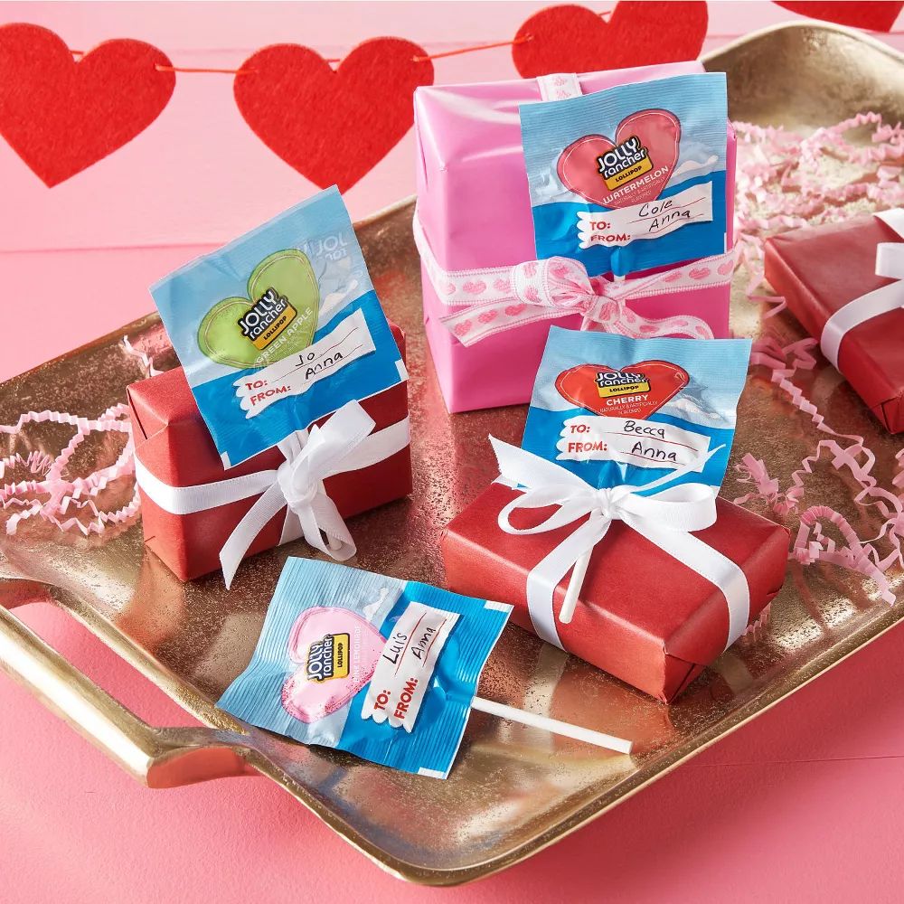 Assorted Jolly Rancher Hearts shaped lollipops from Candy In Bulk, colorful Valentine’s Day edition in a bulk value bag.