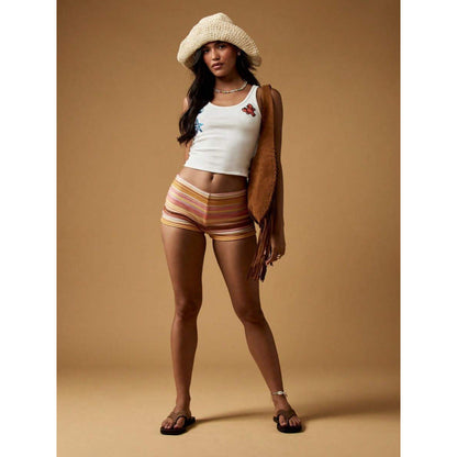 Hollow out lace backless shorts with intricate lace detailing and an open-back design