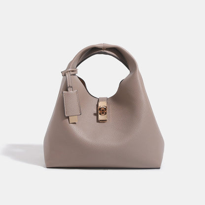 Fashionable handheld shopping basket crossbody bag in a woven design, shown from the front