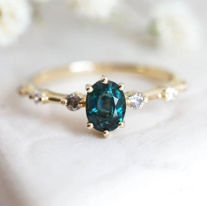Gold-plated ring with emerald inlay close-up