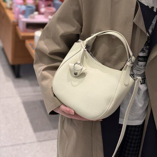 Top-grain cowhide genuine leather women's tote bag with hand-grain texture and versatile design