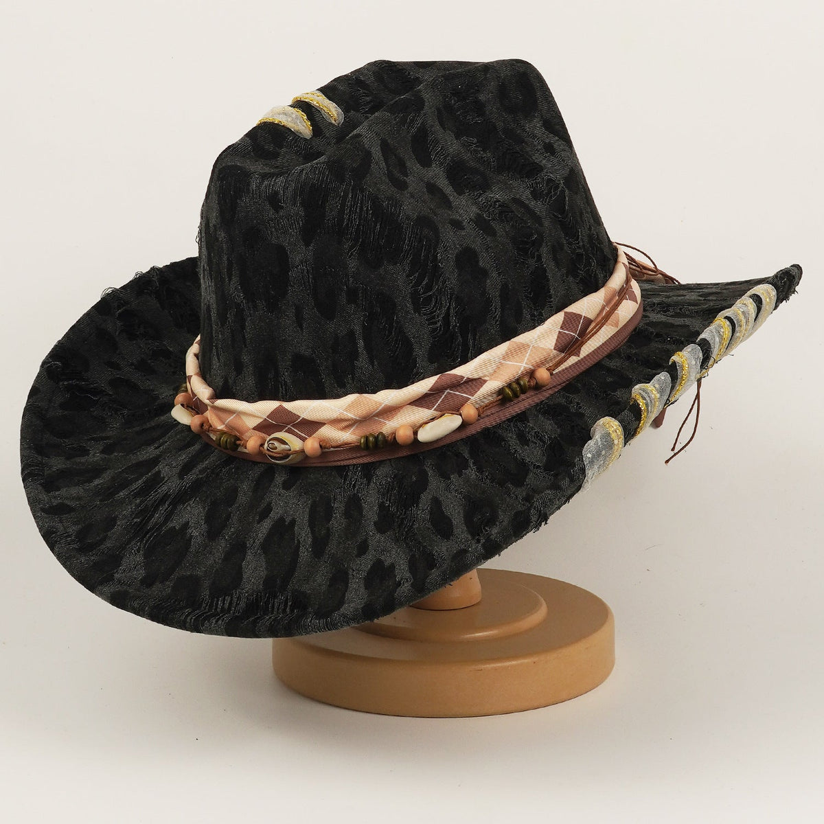 Leopard-print western cowboy hat with a tall top-hat crown and wide sun-shielding brim