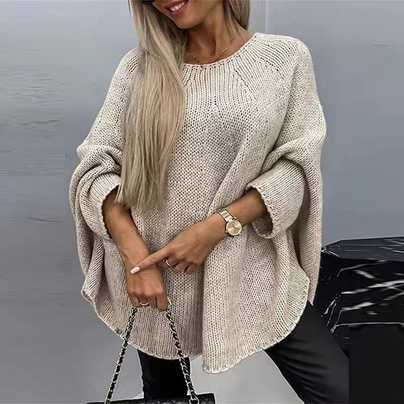 Women's winter oversized knitted shawl sweater with loose batwing sleeves and pullover design