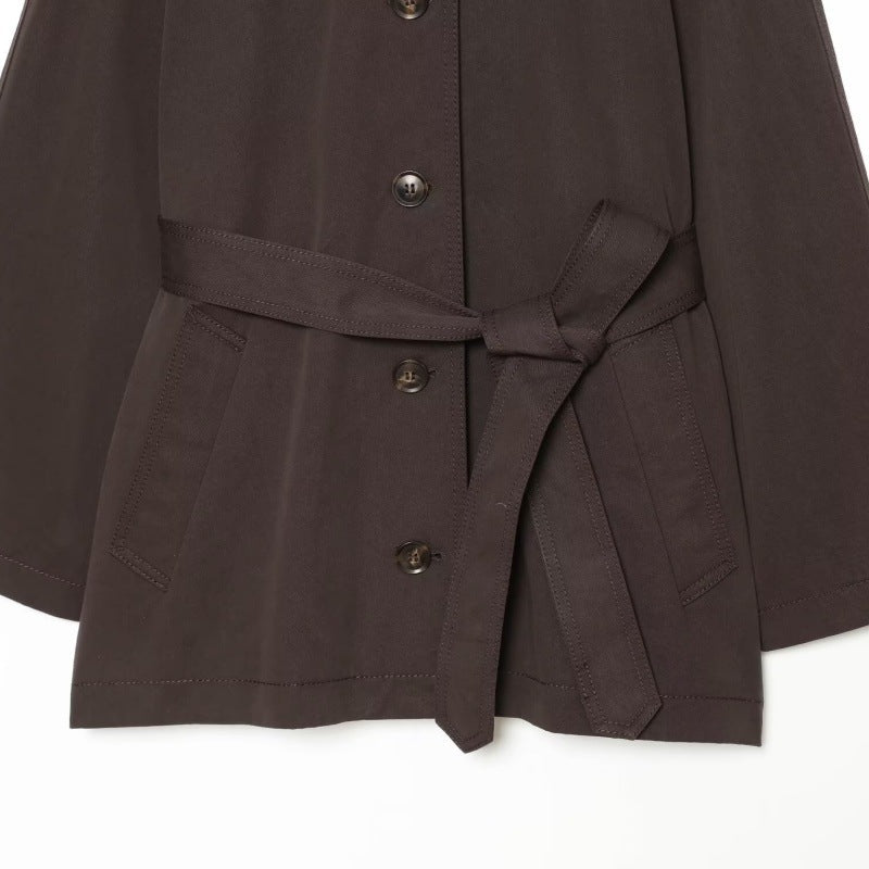 Elegant belted twill-textured trench coat with classic lapels and long sleeves