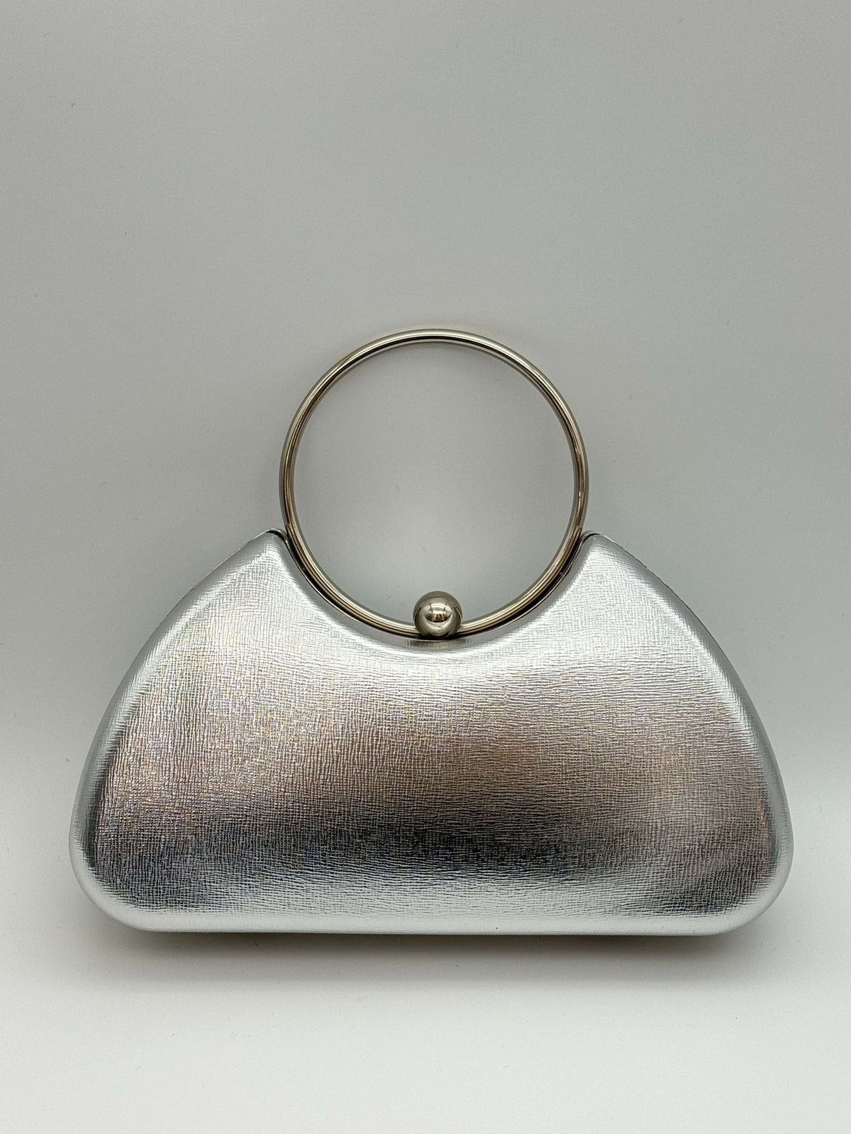 Women's minimalist metal frame evening clutch handbag for parties, featuring a sleek structured design