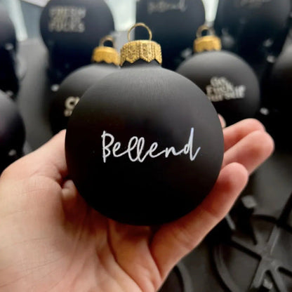 Funny Christmas ornament black decorations hanging on a tree