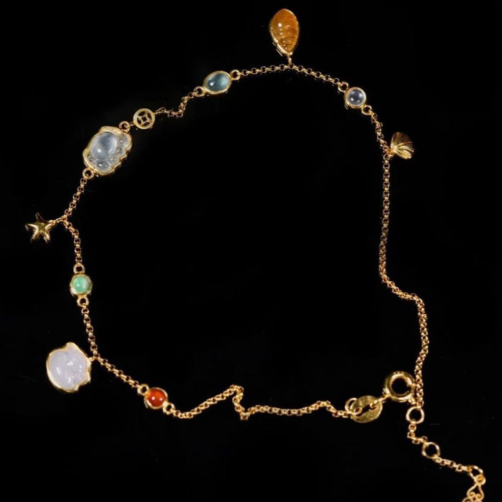 Summer forest-style starfish and shell anklet for women, featuring coastal charms on a delicate chain