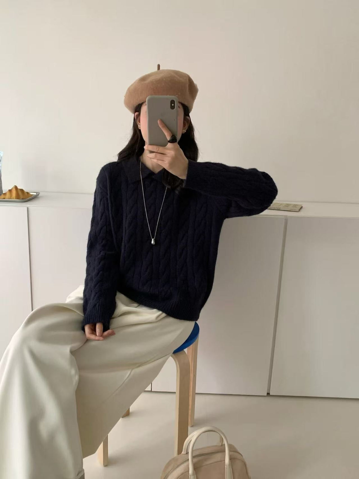 Women's cable-knit lapel pullover sweater in a loose fit for autumn and winter layering