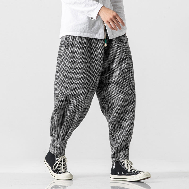Retro-textured thickened woolen casual pants in neutral tone, front view