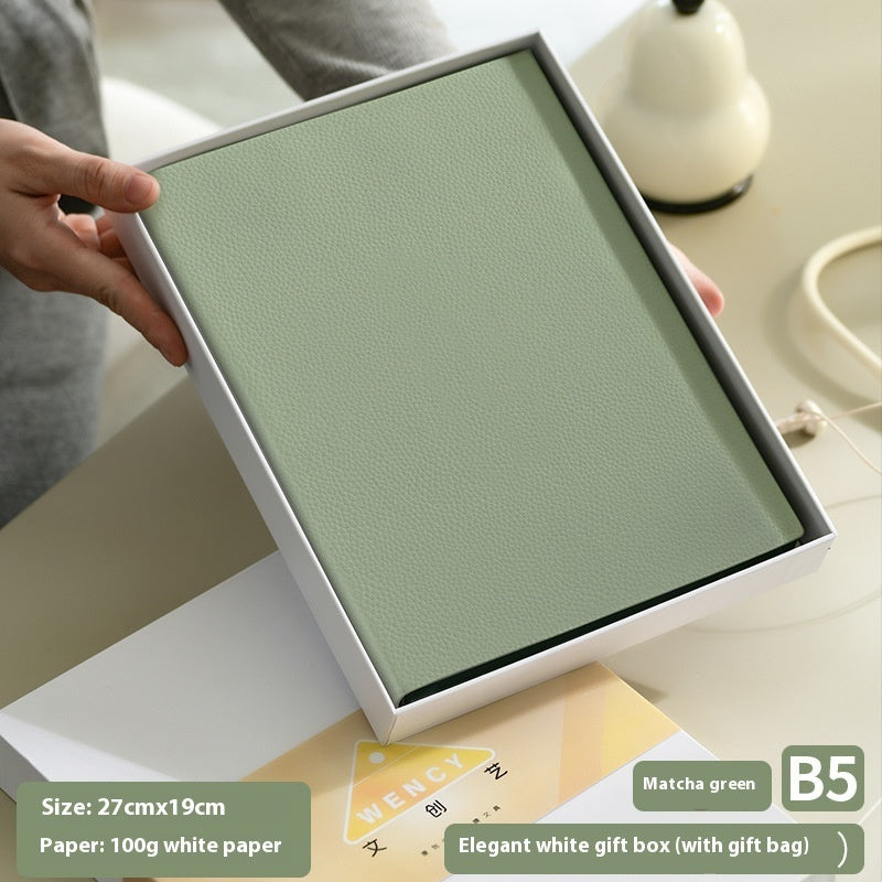 Litchi pattern soft leather covered notebook with textured finish and rounded corners