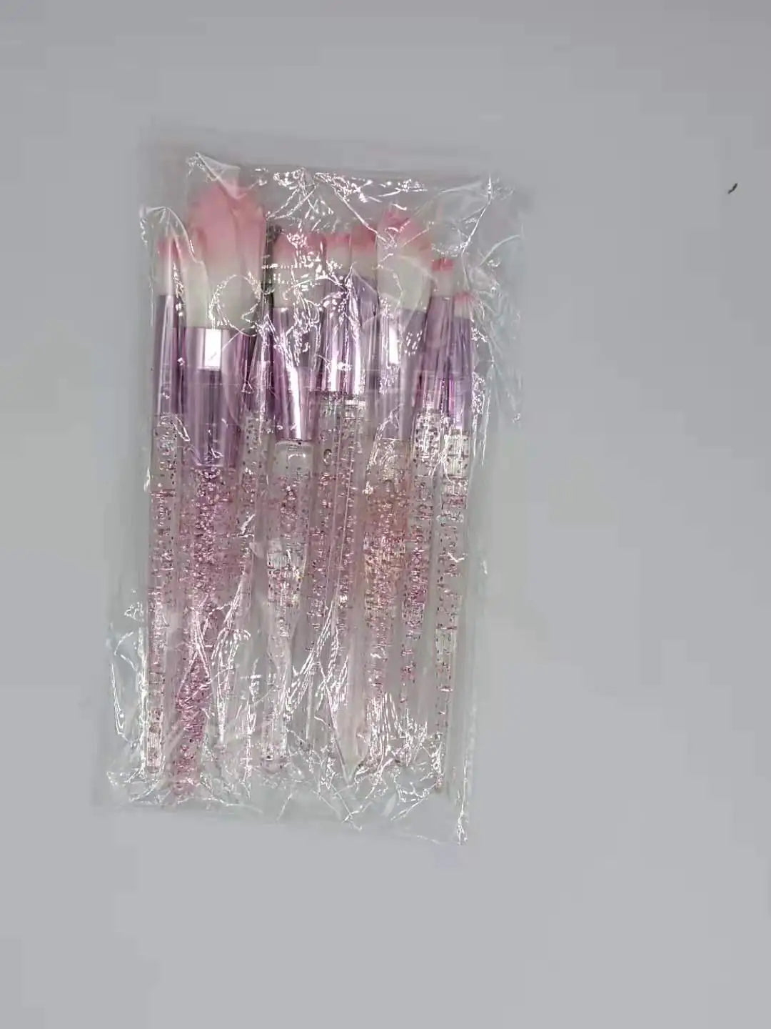 Pink decorative Colorful Makeup Brush Set with Synthetic Fibers in a protective package, designed for flawless blending & contouring.