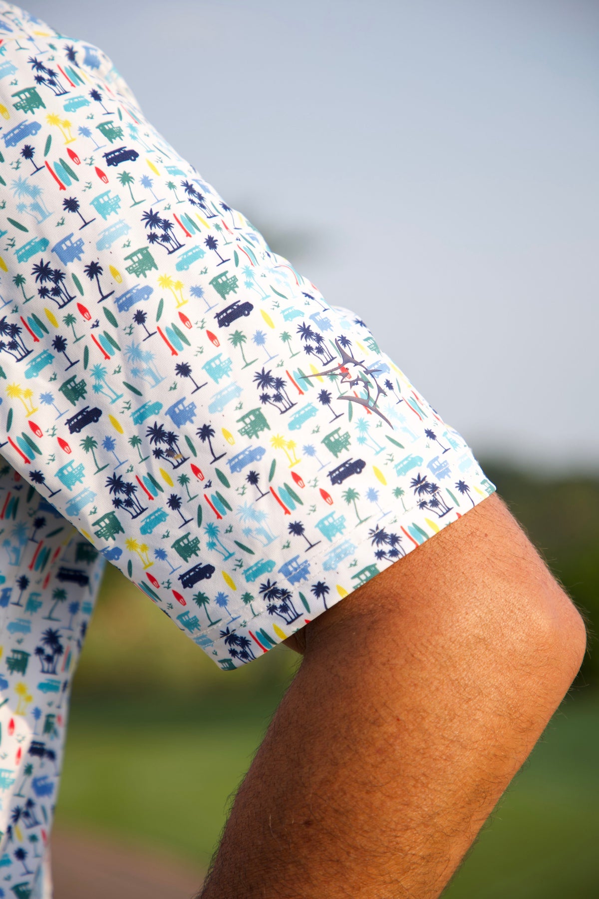 White Water Life Surfs Up Performance Polo in blue and white, casual polo shirt with collar and short sleeves.