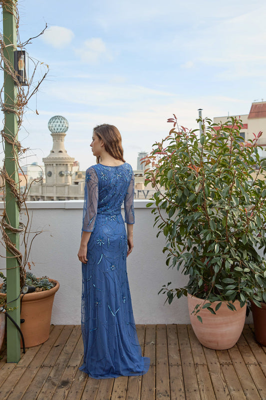 Ceylan Bcn Kalinda long dress in flowing fabric, featuring elegant design and vibrant color, perfect for formal occasions.