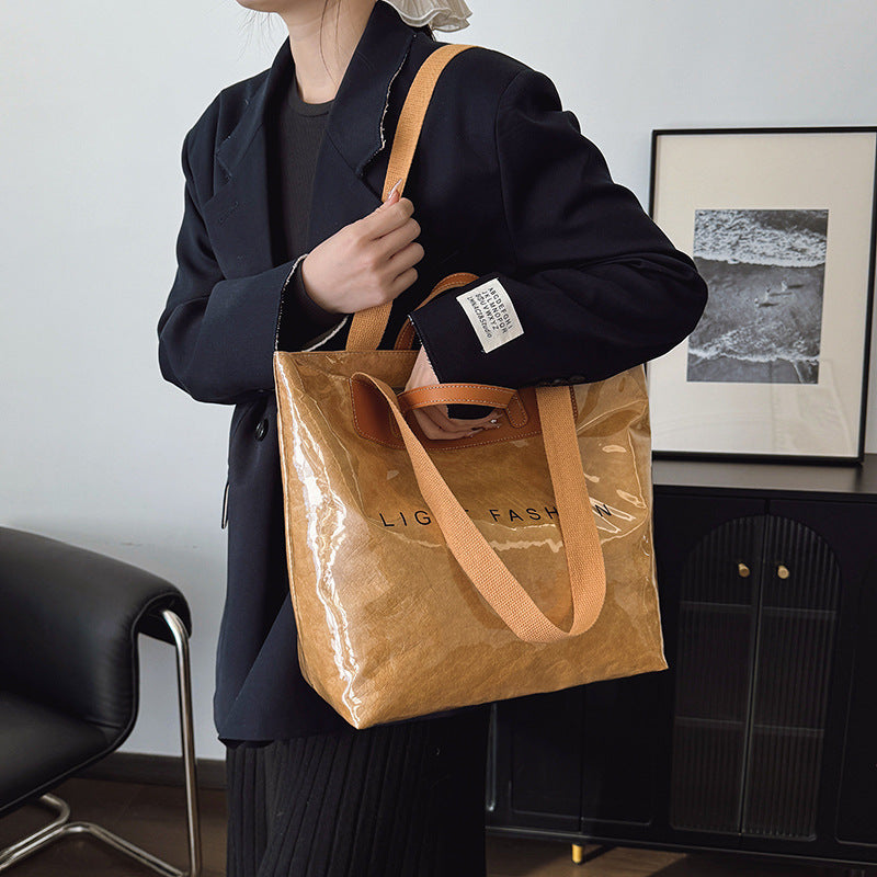 Casual commuter shoulder crossbody bag in a compact design with adjustable strap and multiple pockets