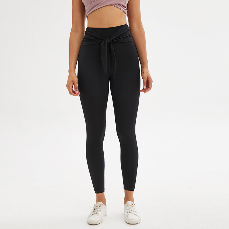 Nine-point legging yoga pants with straps in a sleek, comfortable design