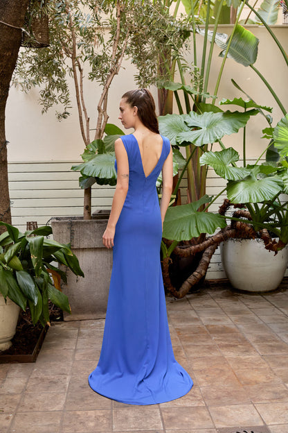 Ceylan Bcn IRIS long dress with flowing fabric, deep V neckline, and elegant design perfect for formal occasions.
