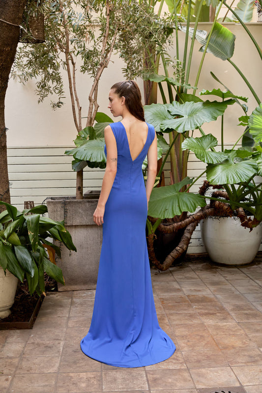 Ceylan Bcn IRIS long dress with flowing fabric, deep V neckline, and elegant design perfect for formal occasions.