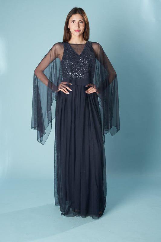 Ceylan Bcn black cape top with flowing fabric and open front, stylish and versatile for layered outfits.
