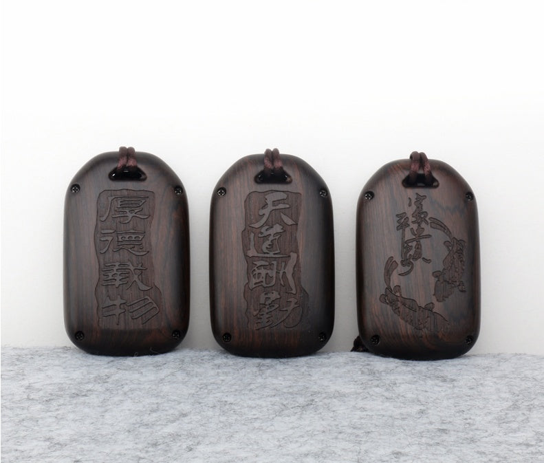 Sandalwood key case with smooth wood finish and compact design