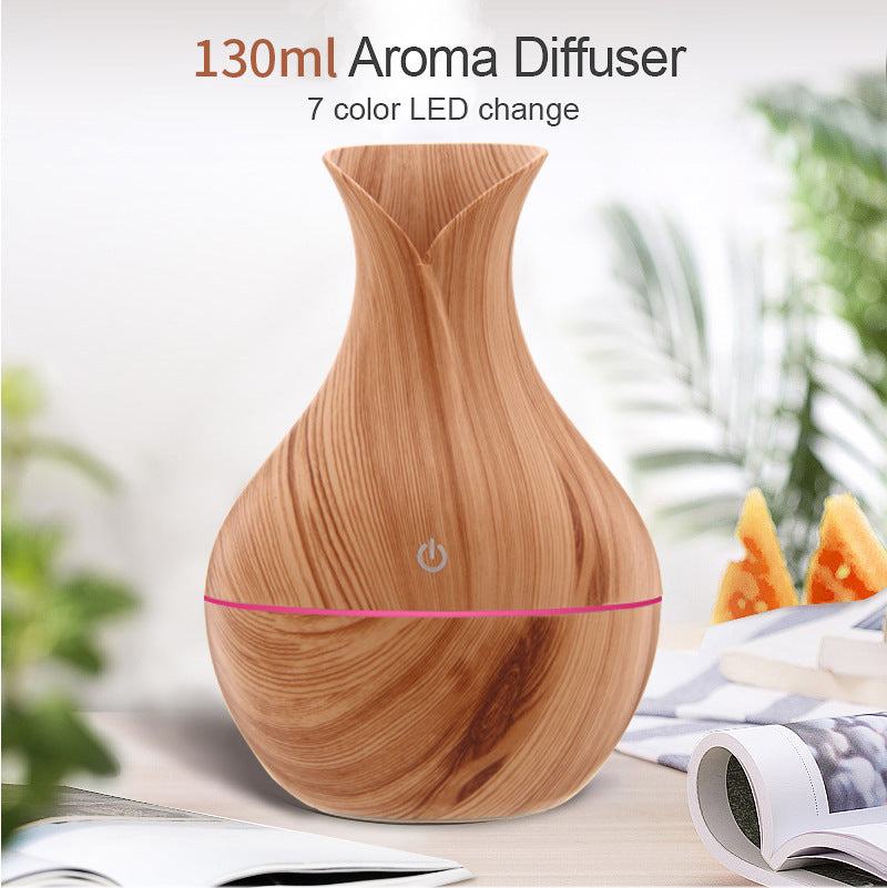 Vase humidifier with elegant decorative design, producing a gentle mist for indoor spaces