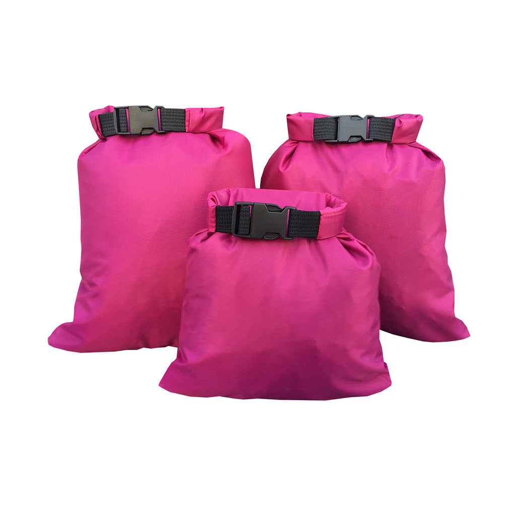 Waterproof dry bags in assorted sizes and colors for protecting gear from water and moisture