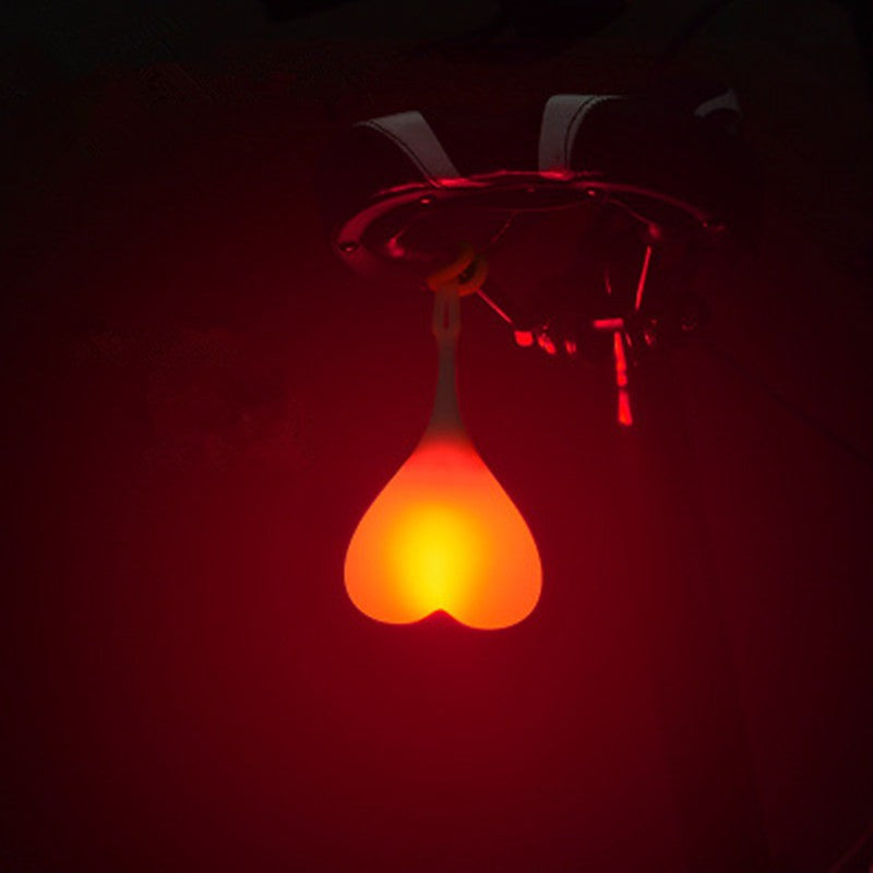 Beating Heart bike rear lights by My Store, red LED lights mounted on a bicycle seat post