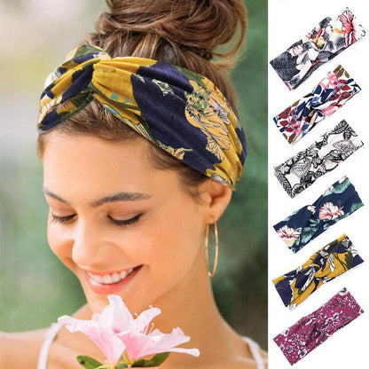 Floral cross hair band by My Store, featuring a delicate flower pattern on a comfortable headband