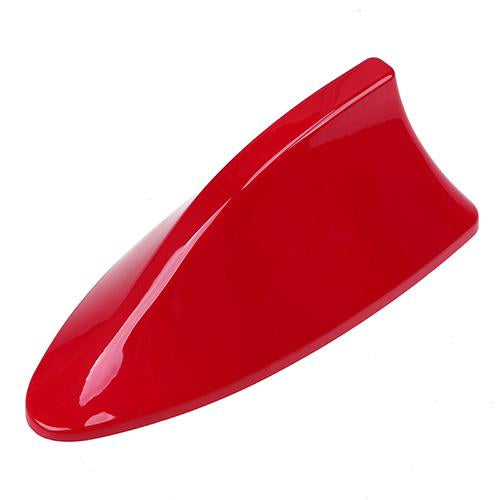 Black car shark fin antenna exterior accessory.