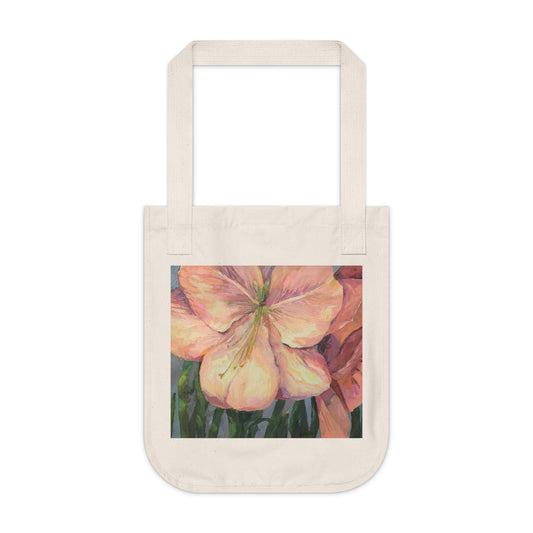 Organic canvas tote bag featuring 'Amaryllis' artwork by Barbara Cleary, showcasing a natural, eco-friendly bag with floral design.