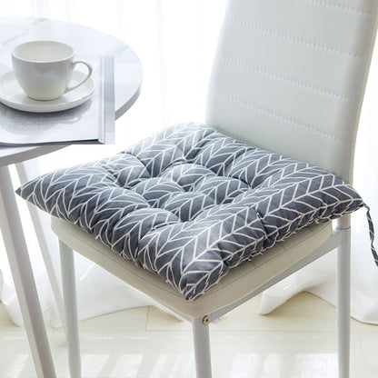 Summer chair cushion in a light, breathable fabric for outdoor seating