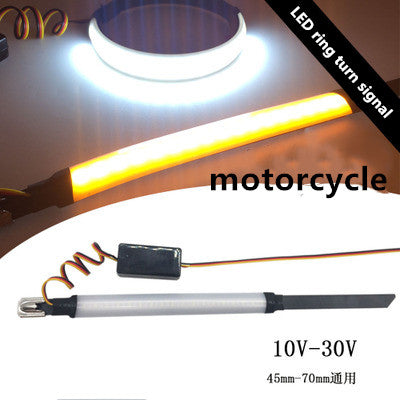Two-color motorcycle LED ring turn signal with front shock absorber modification in black and amber lighting