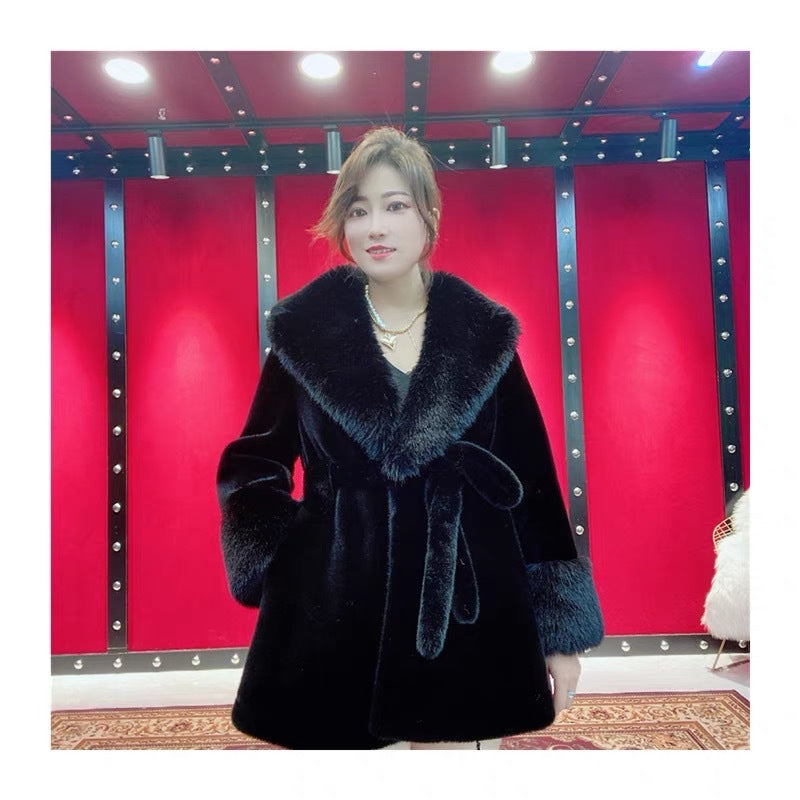 Women's winter fur coat in a new style, full-length outerwear with a plush texture and warm design