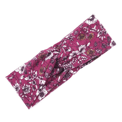 Floral cross hair band by My Store, featuring a decorative flower design and crossed band detail