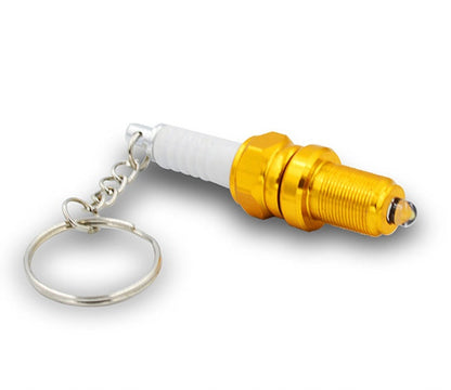 LED light spark plug keychain with compact metallic design and built-in light function