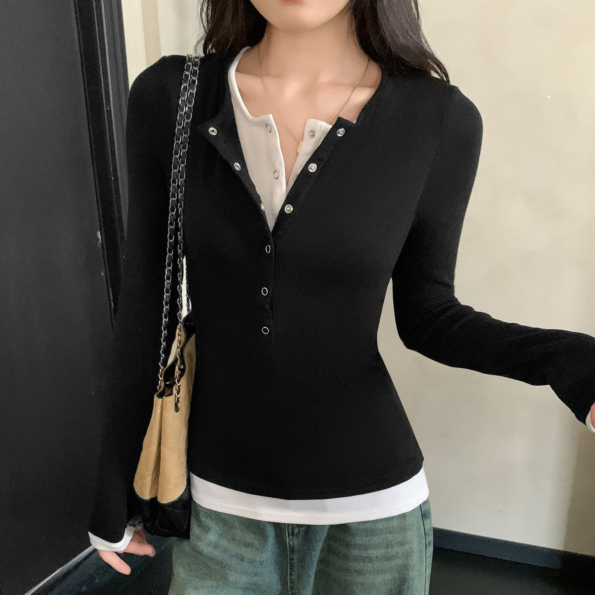 Color-block faux two-piece women's long-sleeve T-shirt top, front view