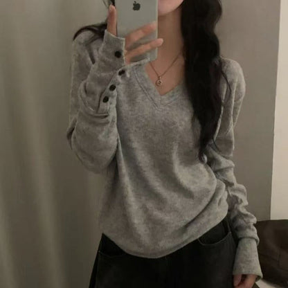 Korean-style elegant versatile top with slit cuffs, front view