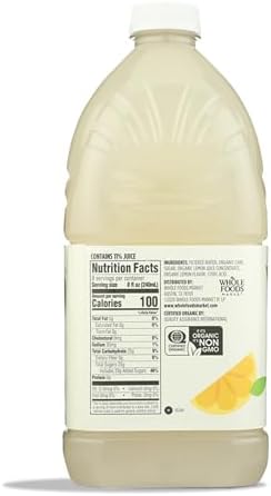 Fresh organic lemonade in a 64 fl oz bottle by 365 by Whole Foods Market, with a yellow lemon and clear beverage visible.