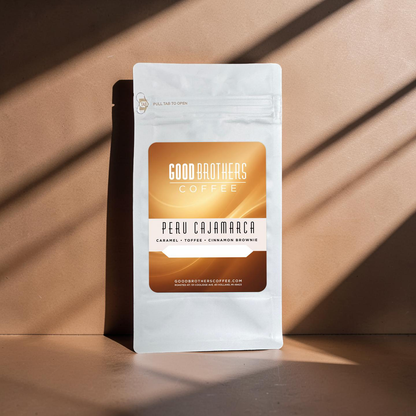 Roasted Peru Cajamarca coffee beans from Good Brothers Coffee LLC displayed in a close-up image.