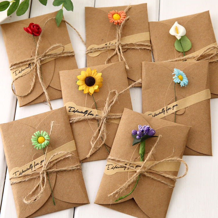 Creative kraft dried flower greeting card with natural botanical design
