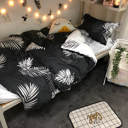 Four-piece Japanese bedding set in a neatly arranged bedroom display