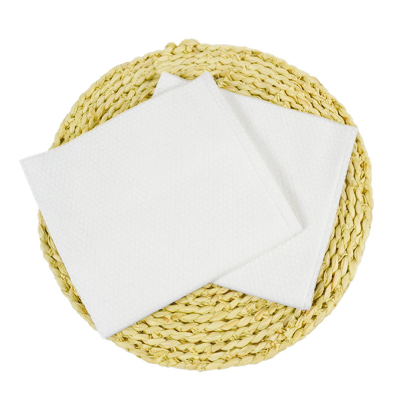 Disposable bath towels folded and stacked for convenient bathing use