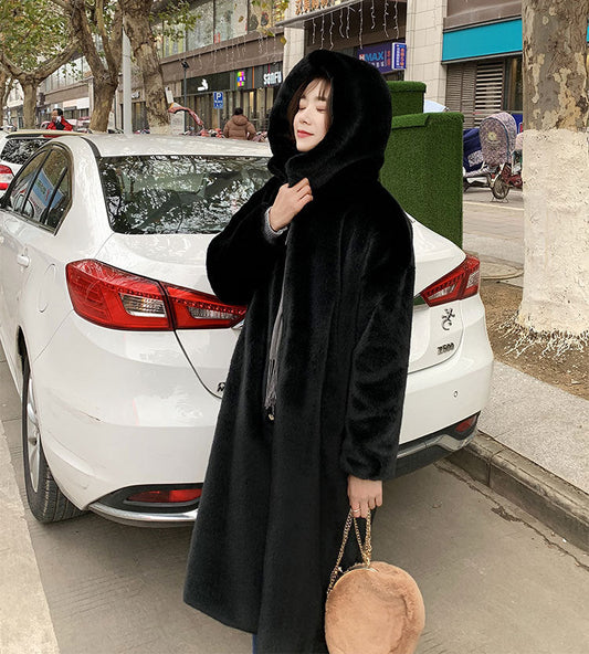 Faux fur mink women’s plush coat in soft textured fabric, full-length design with long sleeves