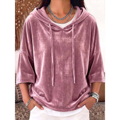 Solid-color velvet hoodie with drawstring and three-quarter sleeves, front view